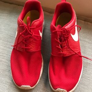 Red Nike sneakers. Worn only a couple times